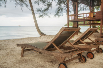 wooden chair at beach