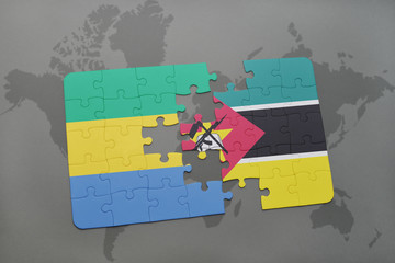 puzzle with the national flag of gabon and mozambique on a world map