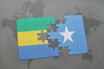 puzzle with the national flag of gabon and somalia on a world map