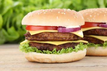 Double Cheeseburger Hamburger frischer Burger Käse Tomaten