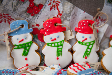 Christmas homemade gingerbread cookies on wooden table