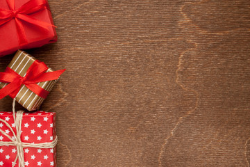 Obraz premium different gifts on wooden background