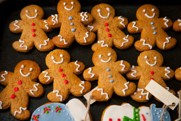 Christmas homemade gingerbread cookies on wooden table