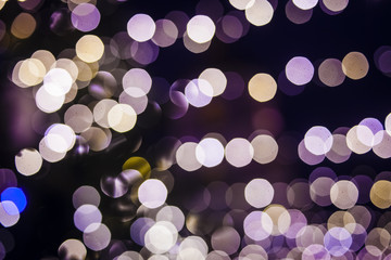 New Year tree in the city. The image is not in focus, beautiful bokeh