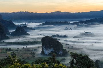 Beautiful Sunrise of travel place with morning mist at Phu Langka National Park in Phayao Province, Thailand