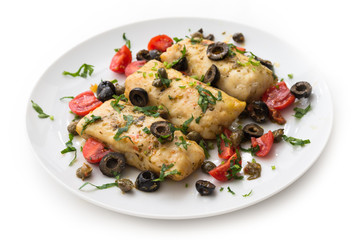 Filetti di merluzzo alla mediterranea, boiled cod fillets with black olives, capers and tomatoes