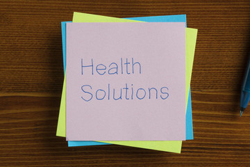 Health Solutions written on a note