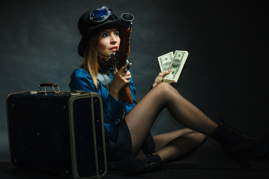 Steampunk girl with cash.