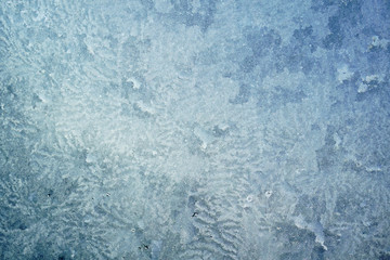 frost crystal on window glass in winter season