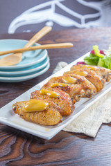 fried chicken wing with mustard sauce