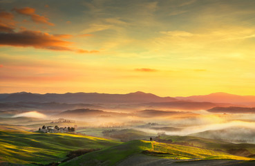 Naklejka na ściany i meble Volterra countryside foggy panorama, Tuscany Italy 