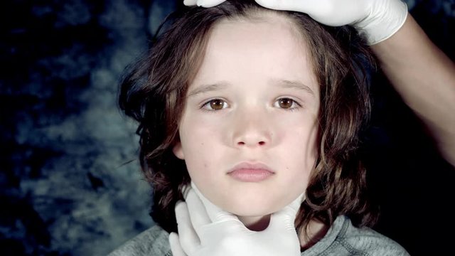 4k Dramatic Shot of a Sick Child Being Examined by Doctor Throat