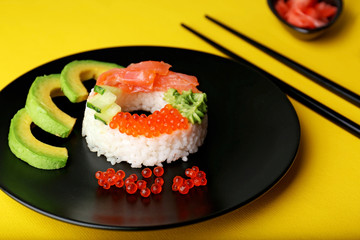 Sushi doughnut on yellow background