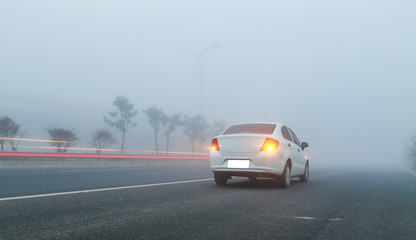Fototapeta na wymiar car in the fog