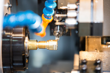machining automotive part by cnc turning machine