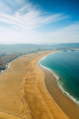 Nazare coast and sandy beach view. Portugal