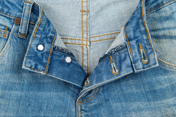 Buttons and buttonhole denim jeans