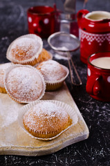 Muffins in powdered sugar