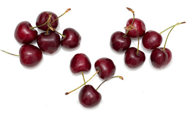 red cherries on a white background