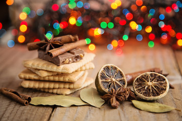 Close-up of christmas bisquits with christmas lights at backgrou