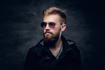 Portrait of bearded man in sunglasses.