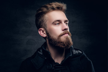 Portrait of bearded stylish young male.