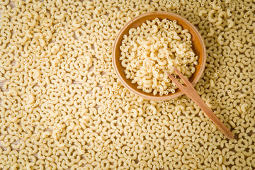 Macaroni pasta background. Healthy eating and lifestyle.