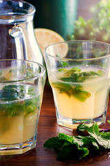Homemade lemonade with mint, selective focus