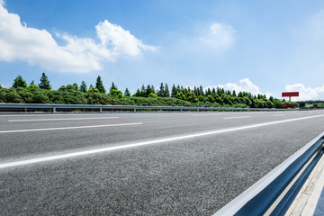 Asphalt road and forest