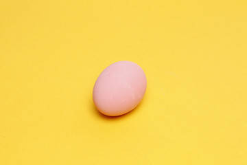 Preserved egg on yellow background, Asian Traditional Food, pink