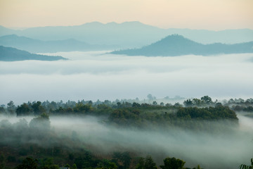 Sunrise and sea of clouds over Pai District Mae Hong Son, THAILAND. View from Yun Lai Viewpoint is...
