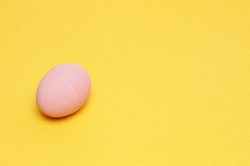 Preserved egg on yellow background, Asian Traditional Food, pink