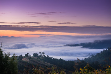 Sunrise and sea of clouds over Pai District Mae Hong Son, THAILAND. View from Yun Lai Viewpoint is located about 5 km to the West of Pai town centre above the Chinese Village.