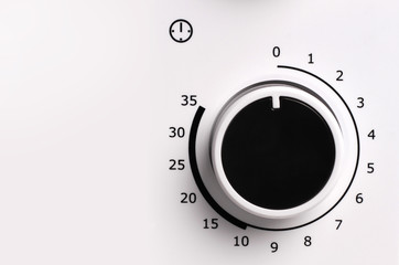 Round analog microwave oven timer, Black icon on white backgroun