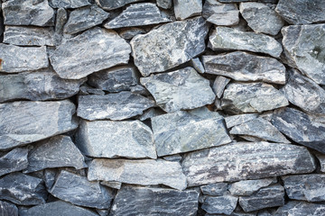 Fototapeta premium Stone texture background for design with copy space for text or image. Stone motifs that occurs natural. Dark edged.