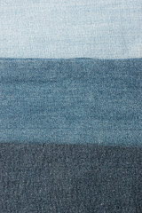 jeans of different colors as a background