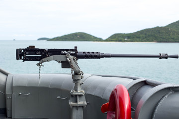 Machine gun on the side of Thai Navy warship