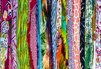 Scarfs silk headdresses, bright textile background