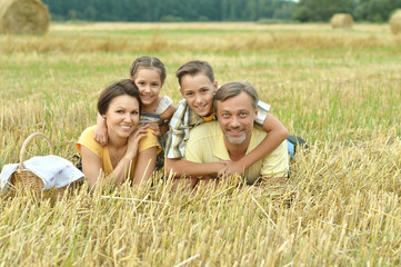 Fototapeta premium happy family at field