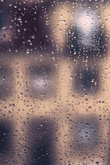 Obraz na płótnie Canvas Drops Of Rain On Window as Background. Rainy autumn day. Soft co
