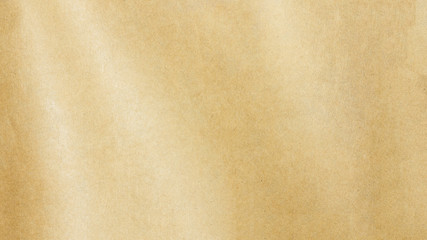 Recycled crumpled brown paper texture or paper background for design with copy space for text or image.
