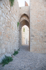 Fototapeta na wymiar landmark of fortification arch and tower in ancient castle of Santa Catalina or St Catherine, from XIII century, public monument in Jaen city, Andalusia, Spain Europe 