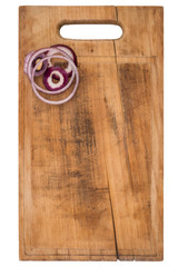 Fototapeta premium Sliced onion rings on a cutting board. Isolated on white.
