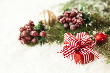 Christmas gift box on carpet