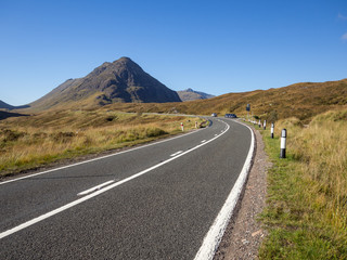 Road heading down Glencoe Scotland towards Buachaille Etive Mor