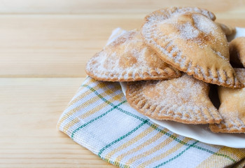 Trucha de batata, typical Christmas sweet in Canary Islands, Spain. Canary pastries traditionally filled with sweet potatoes paste or cabell d'angel.
