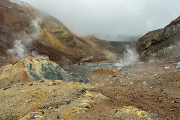 Climbing to active volcano Mutnovsky on Kamchatka.
