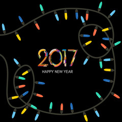 Fototapeta premium Christmas garland with colored lights. Garland scattered around the inscription 2017. 