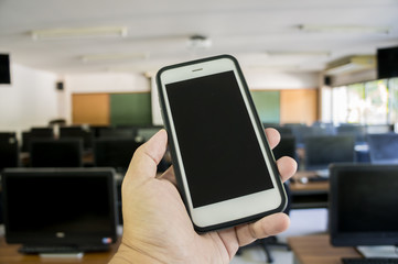 Classroom Computer. Smartphone in Classroom Education.