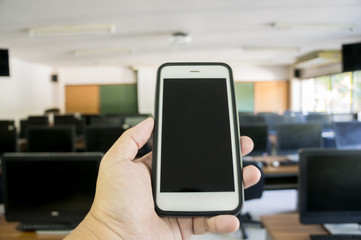 Classroom Computer. Smartphone in Classroom Education.